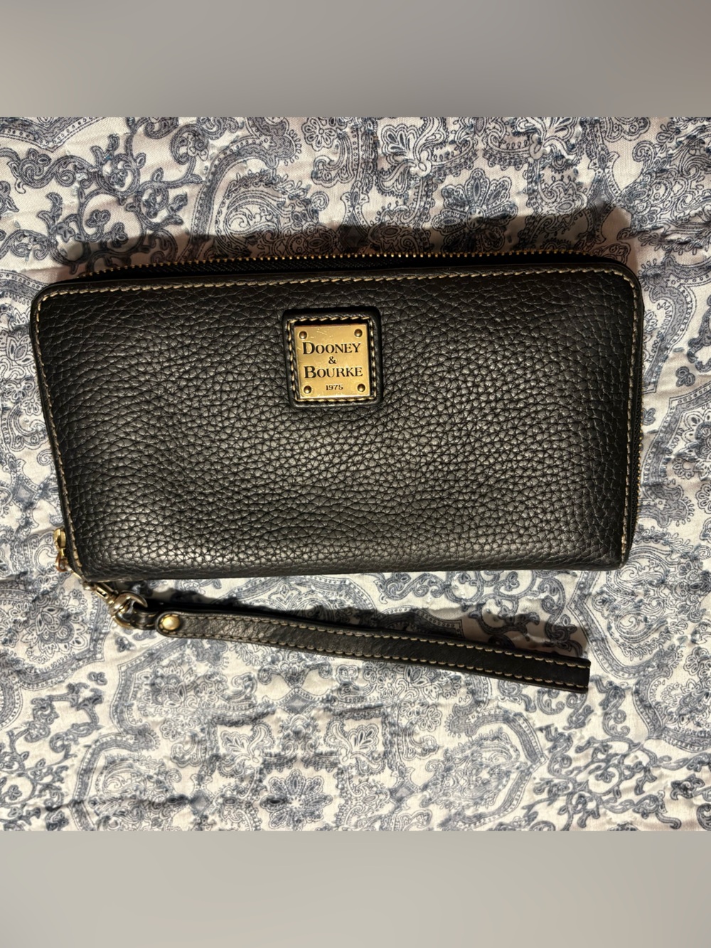 Dooney & Bourke Black Pebbled Leather Zip-Around Wristlet with Gold Plaque